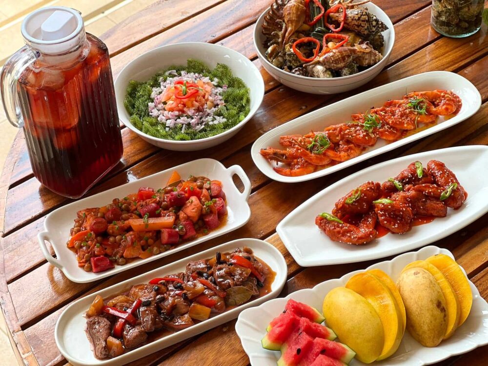 Panganan At Adayo Cove outdoor dining setup overlooking the sea