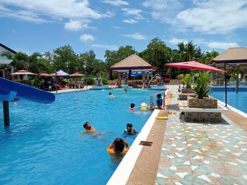 Illustration of a family enjoying a tropical resort swimming pool with palm trees and ocean views